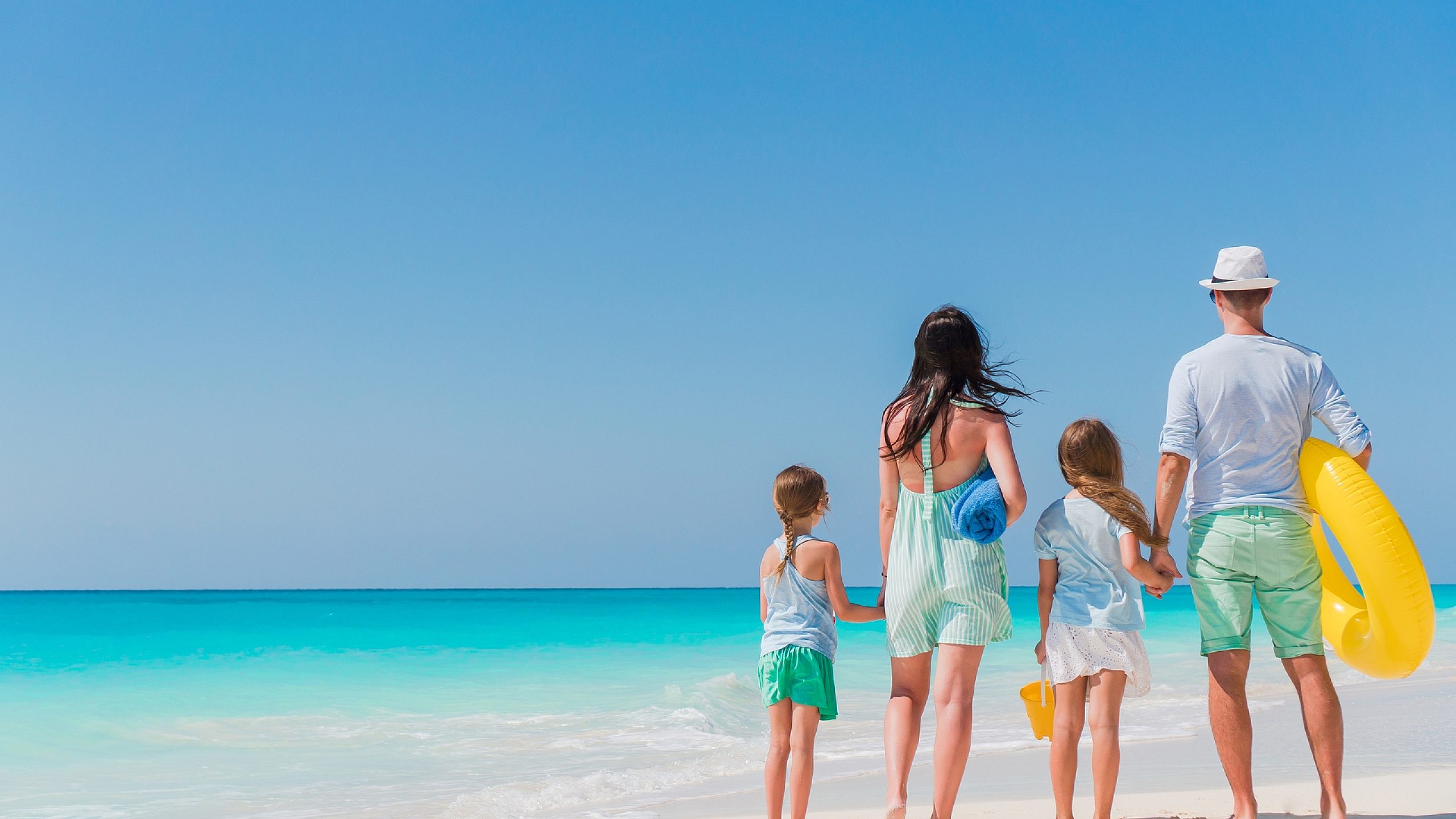 1920 happy beautiful family on white beach having fun